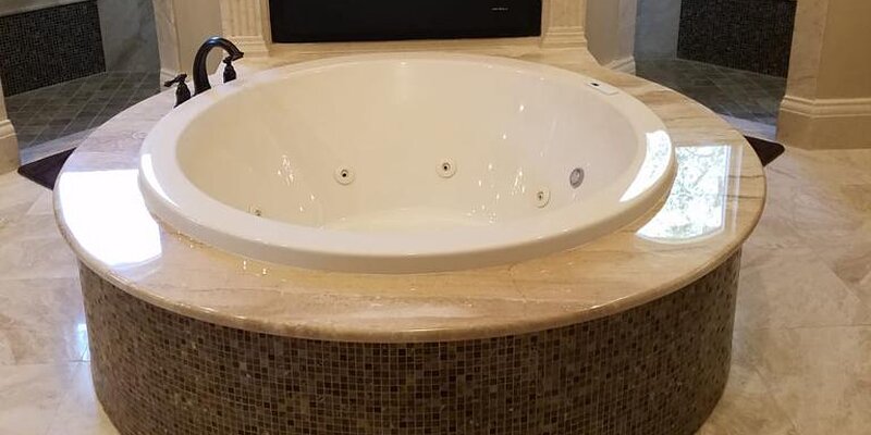 Bathroom Remodeling Tampa - White Cabinets with Granite Countertop